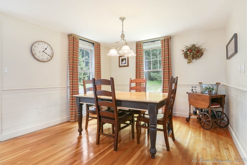 19 Bare Hill Road Boxford, MA 01921 - Photo 7 of 30 a view of a dining room with furniture window and wooden floor