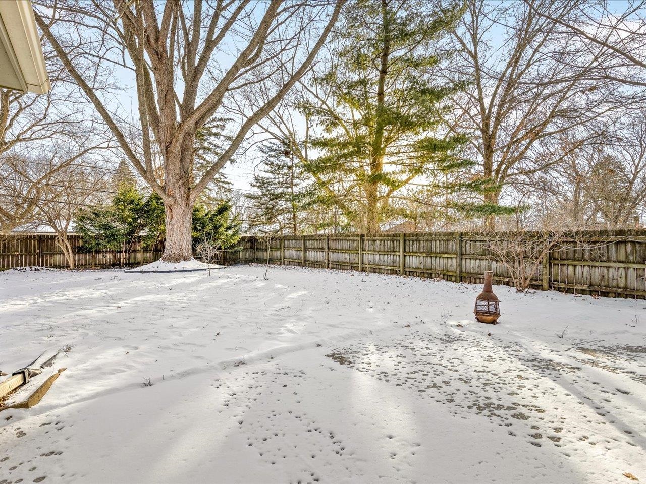 4701 Highcrest Road Rockford, IL 61107 - Photo 22 of 23 a view of outdoor space with trees