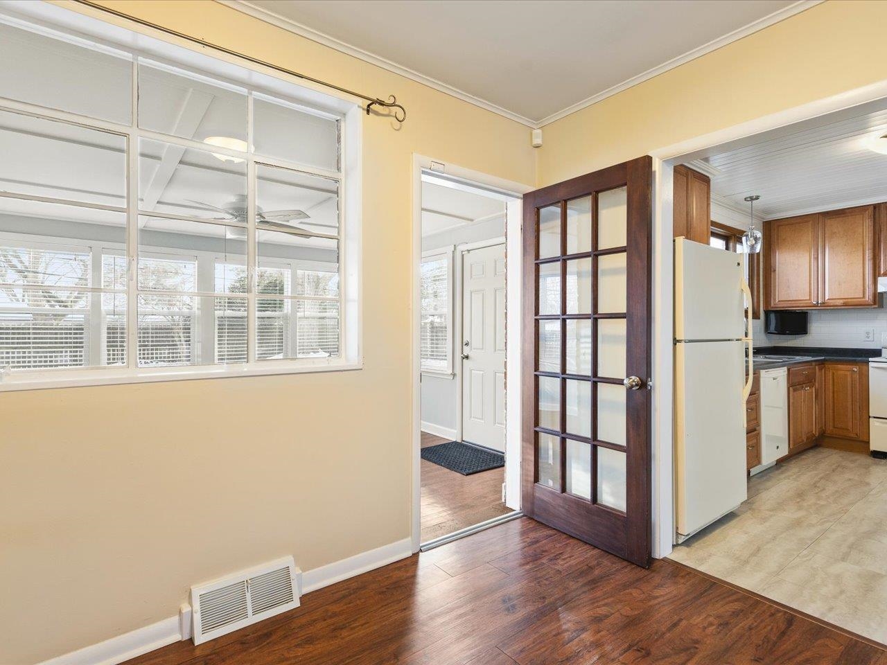4701 Highcrest Road Rockford, IL 61107 - Photo 6 of 23 a view of a kitchen with wooden floor and electronic appliances