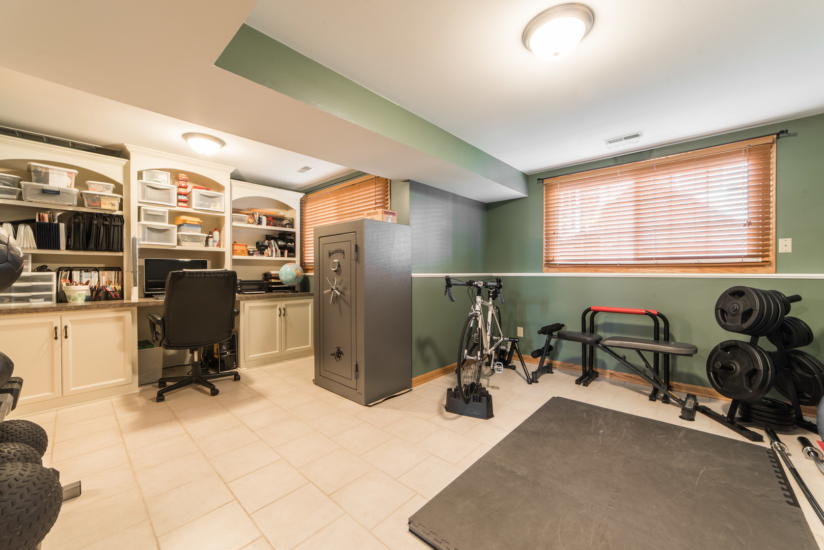 508 South Peace Road, Unit 508 Sycamore, IL 60178 - Photo 23 of 29 a room with gym equipment and a window