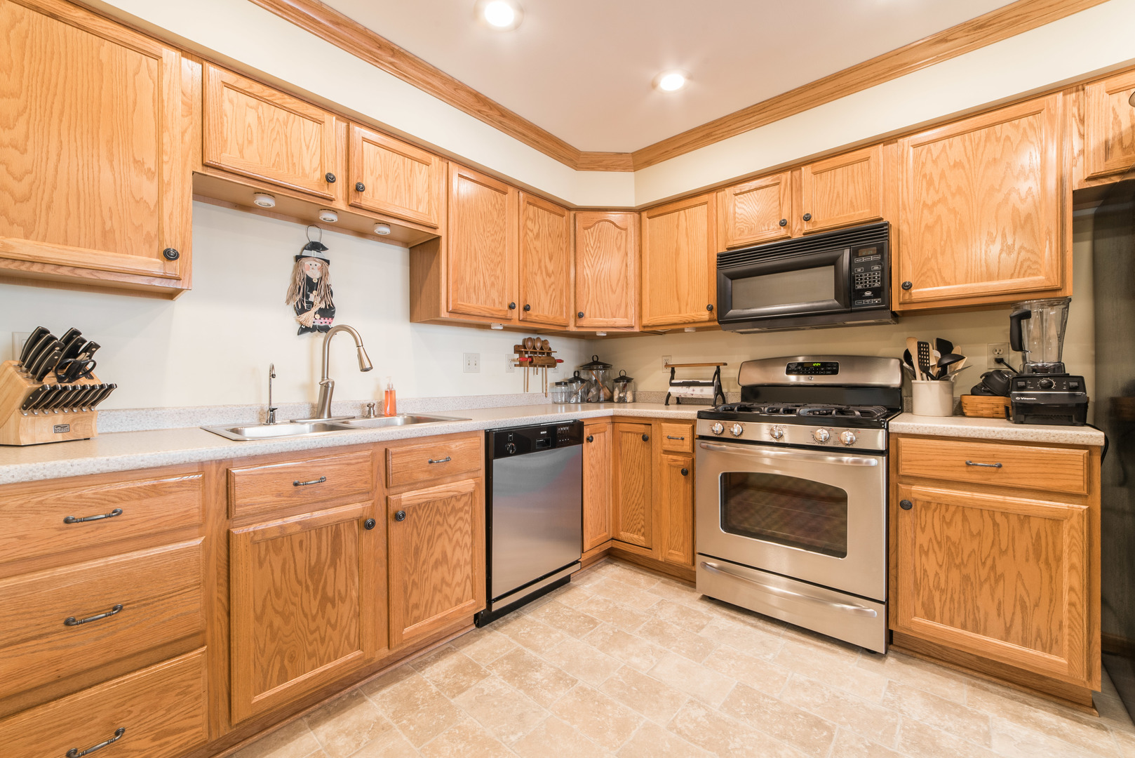 508 South Peace Road, Unit 508 Sycamore, IL 60178 - Photo 9 of 29 a kitchen with stainless steel appliances granite countertop a sink and cabinets