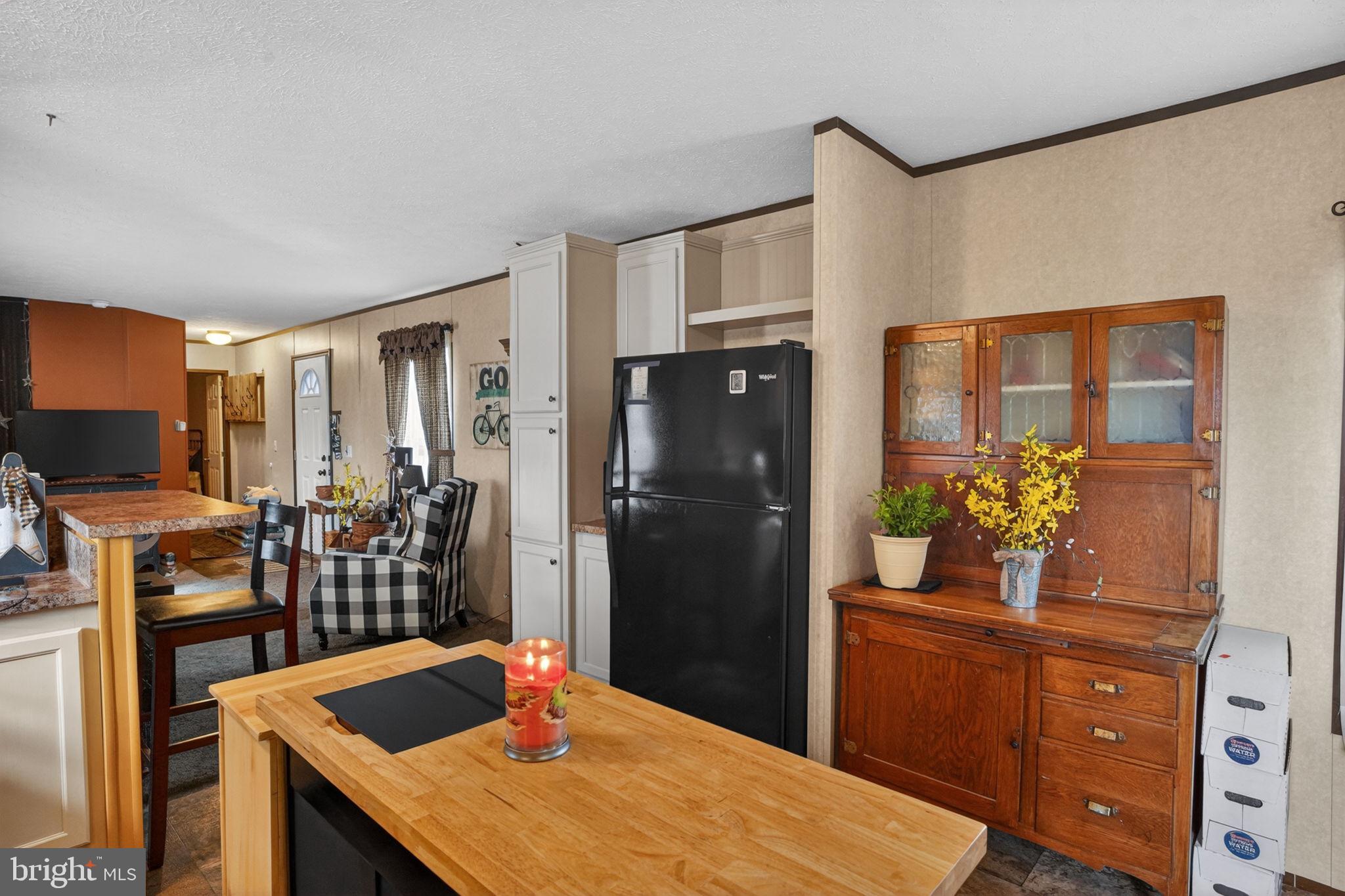 39 Country Club Road West Northampton, PA 18067 - Photo 5 of 26 a kitchen with a table and refrigerator