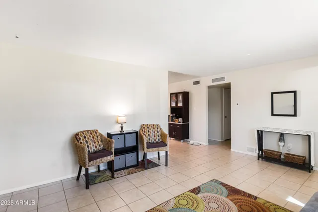 a kitchen with stainless steel appliances a refrigerator and a stove top oven