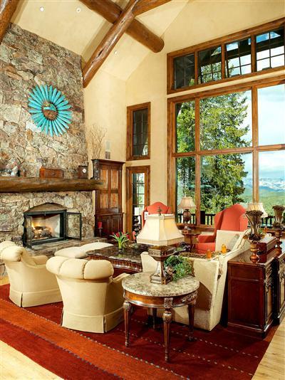 2509 Daybreak Ridge Road Avon, CO 81620 - Photo 1 of 19 a living room with fireplace furniture and a large window