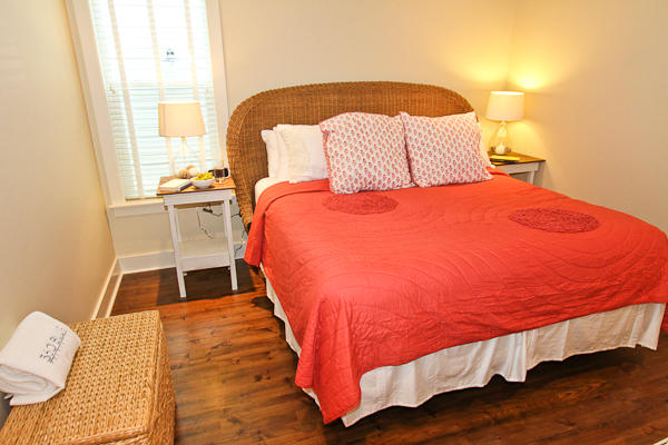 17 Red Basil Drive Santa Rosa Beach, FL 32459 - Photo 8 of 20 a bed sitting in a bedroom next to a window