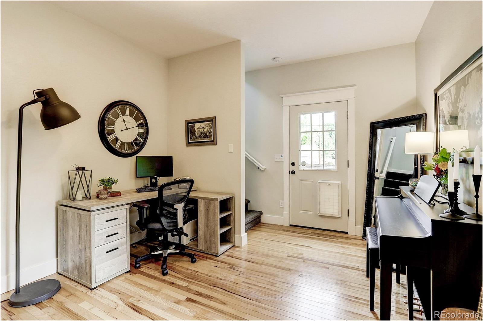 2735 West 35th Avenue Denver, CO 80211 - Photo 17 of 33 a view of a workspace with furniture and a window