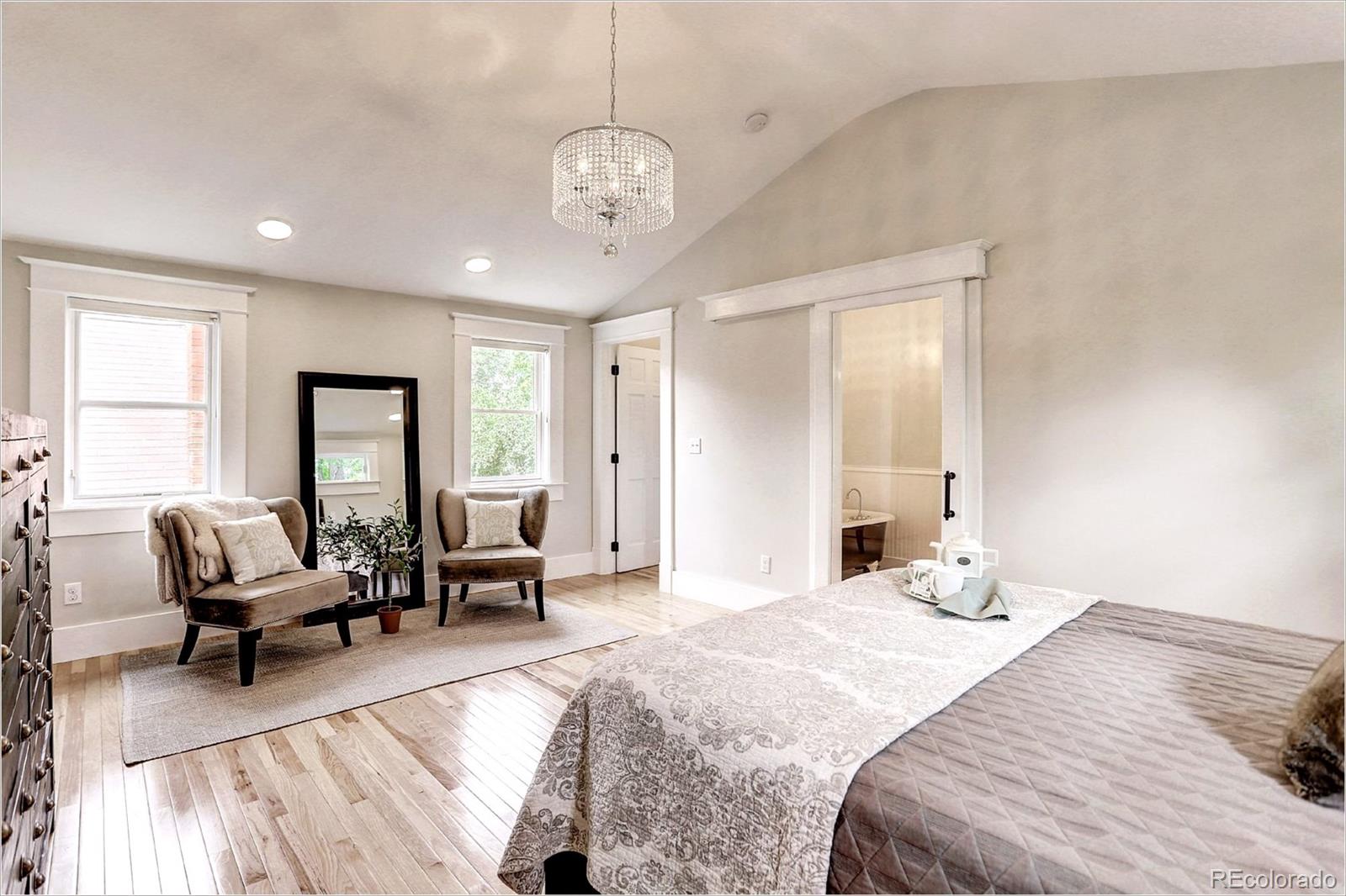 2735 West 35th Avenue Denver, CO 80211 - Photo 20 of 33 a bedroom with a bed and furniture