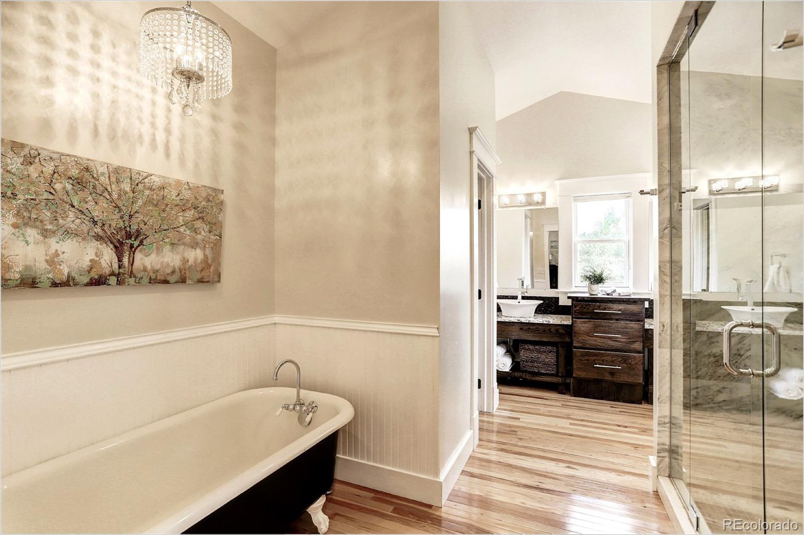 2735 West 35th Avenue Denver, CO 80211 - Photo 24 of 33 a bathroom with a bathtub and a sink