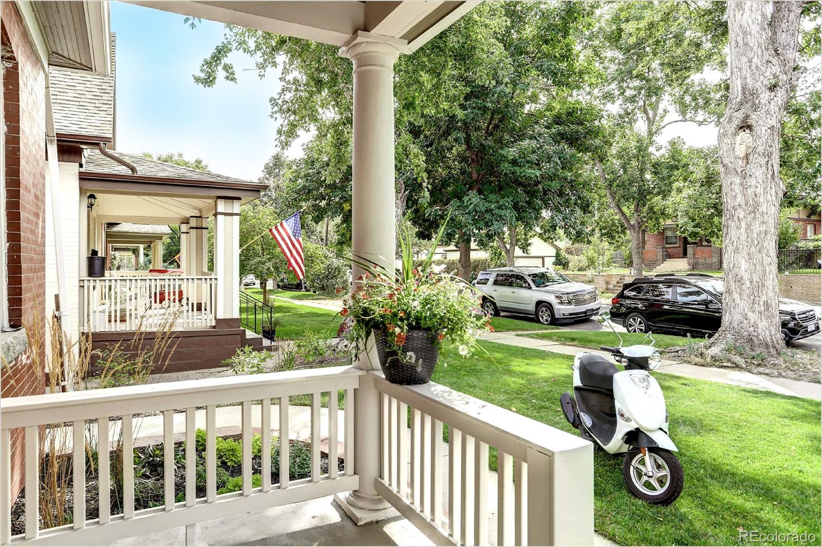 2735 West 35th Avenue Denver, CO 80211 - Photo 4 of 33 a view of a porch with furniture and garden