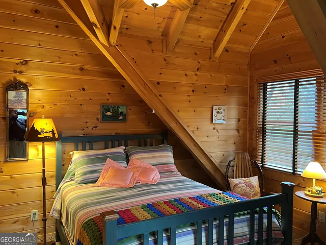 a view of a porch with wooden floor