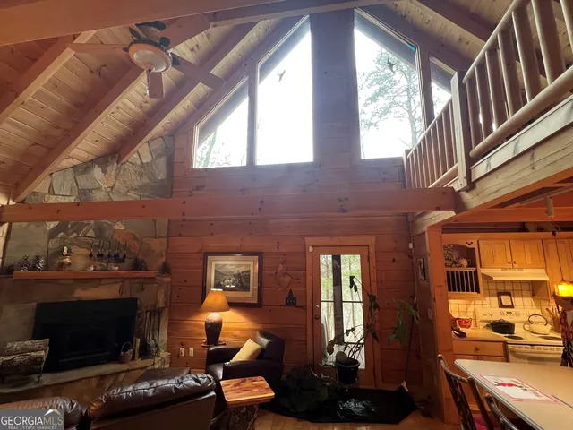 a kitchen with a sink cabinets and a stove top oven