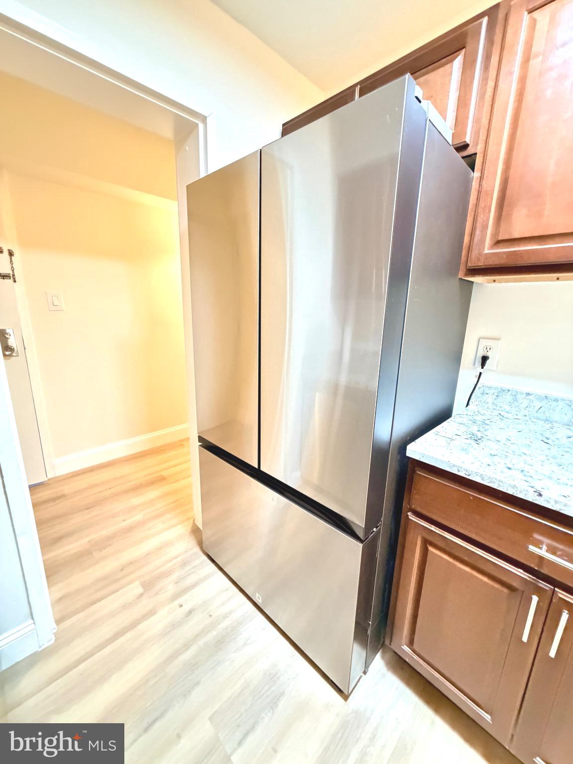 2316 Freetown Court, Unit 1B Reston, VA 20191 - Photo 9 of 36 a view of a bathroom with a sink and a mirror