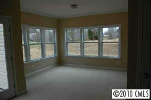 274 Ranlo Avenue Gastonia, NC 28054 - Photo 5 of 8 a view of an empty room with a window