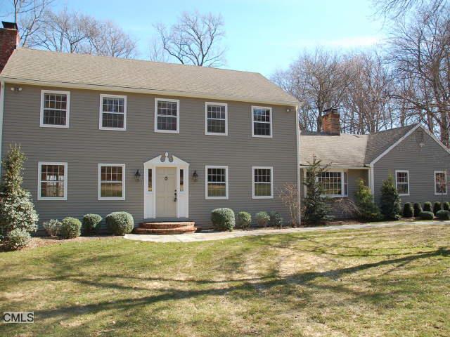 199 Bittersweet Road Fairfield, CT 06824 - Photo 1 of 1 a front view of a house with a yard