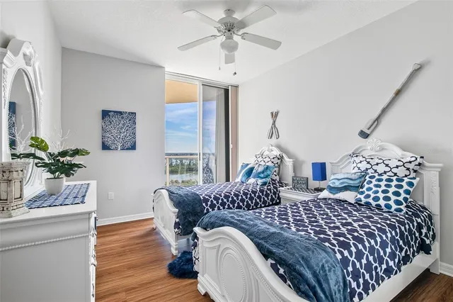 a bedroom with bed and window