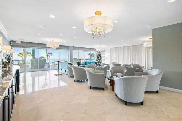 a living room with furniture covered with furniture