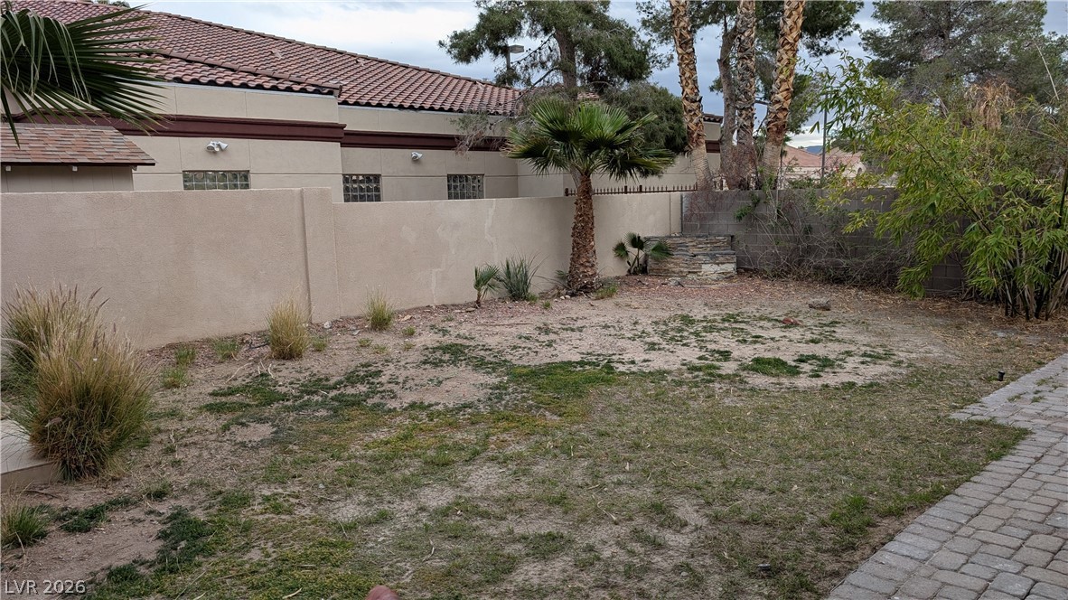 2670 Ridgewater Circle Henderson, NV 89074 - Photo 21 of 22 This spacious yard offers ample opportunity to create your outdoor haven.