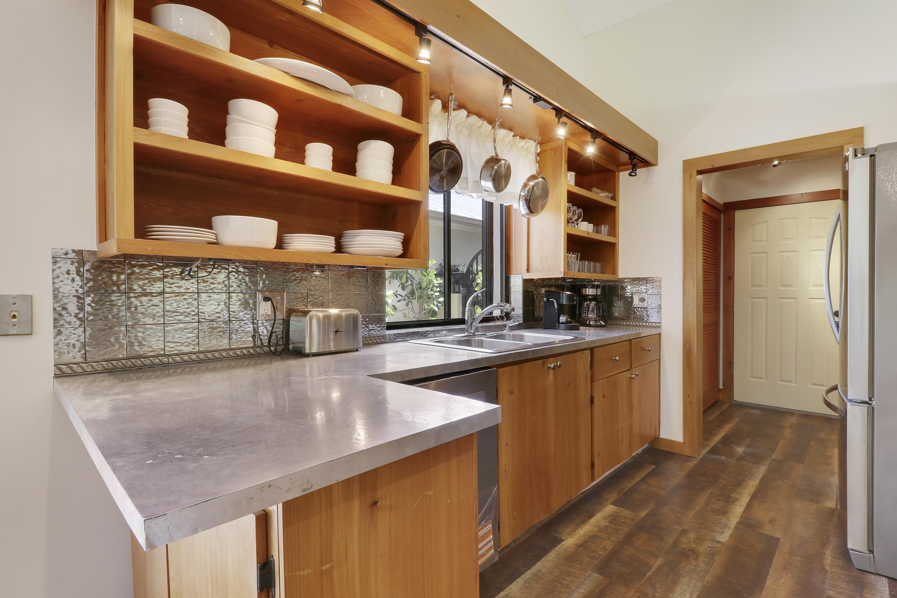 109 Seashore Drive Jupiter, FL 33477 - Photo 9 of 46 Kitchen with Stainless Appliances