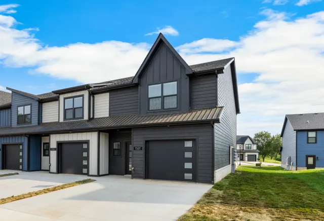 a house that has a tree in front of it