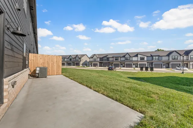 a view of a house with a big yard