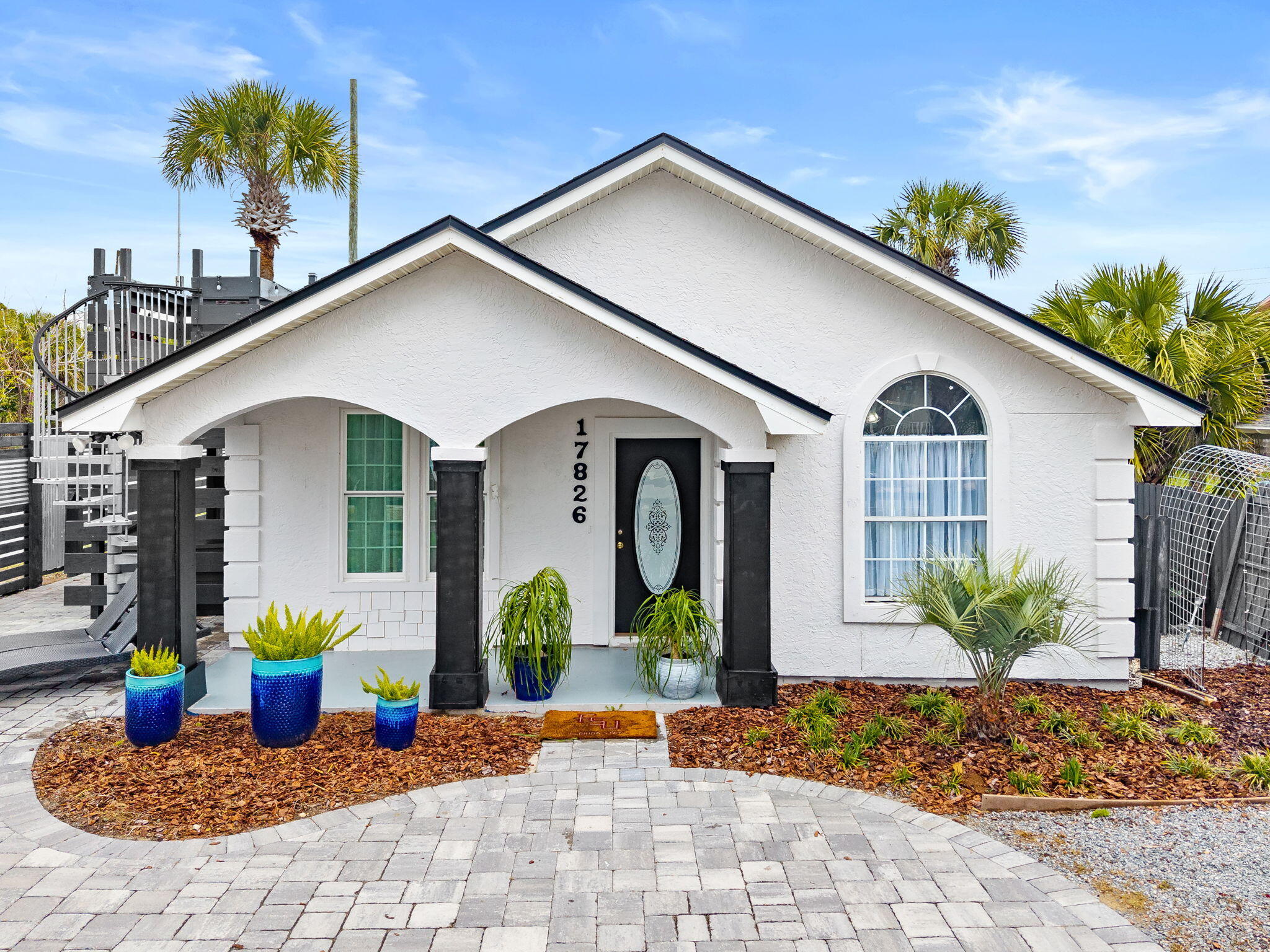 a front view of a house with patio