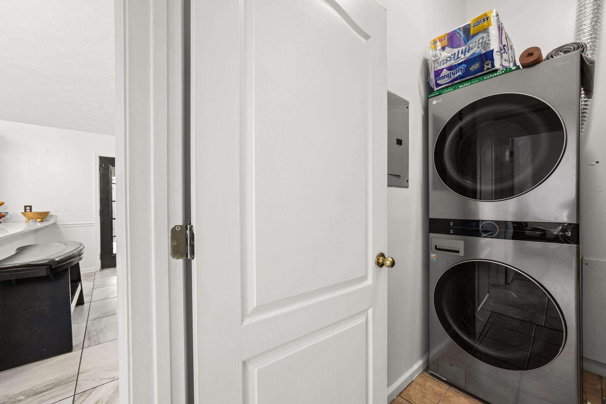 17826 Front Beach Road Panama City Beach, FL 32413 - Photo 16 of 34 a view of a hallway with washer and dryer