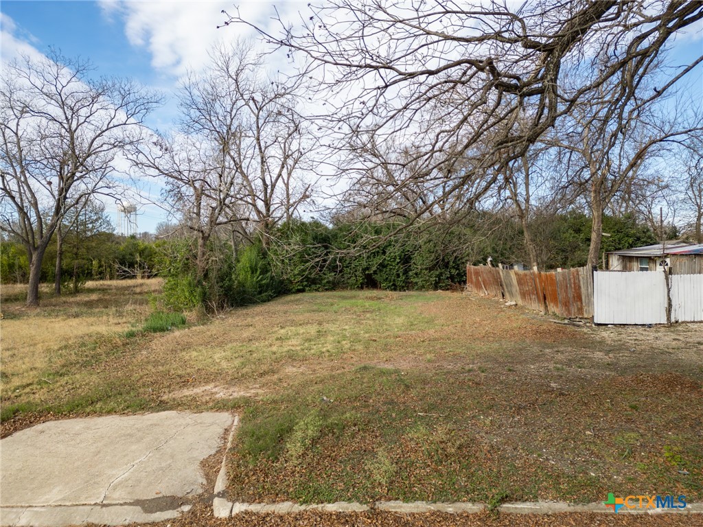 1206 South 24th Street Temple, TX 76501 - Photo 1 of 1 a view of a yard with large trees