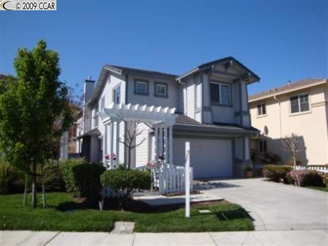 5176 Academy Road Concord, CA 94521 - Photo 1 of 1 a front view of a house with a yard and garage