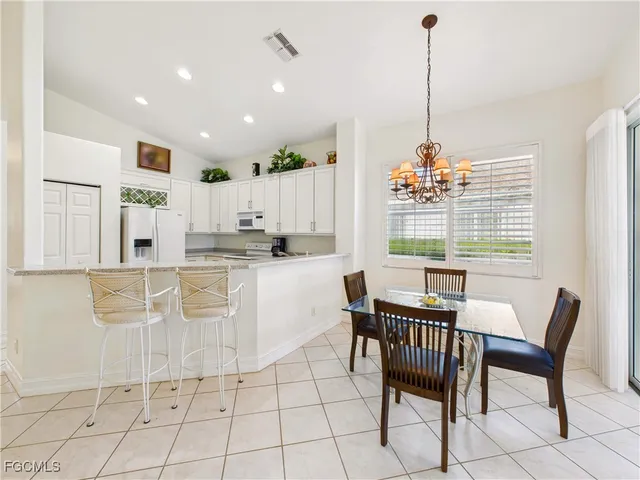 a view of kitchen with breakfast area