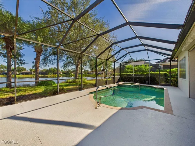 a view of swimming pool with a patio