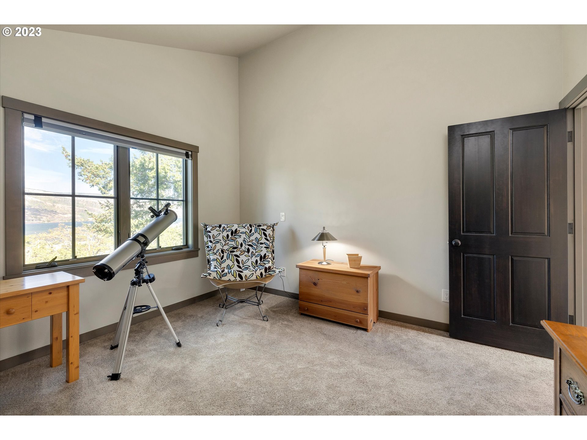 915 Fifth Avenue Mosier, OR 97040 - Photo 19 of 34 a room with gym equipment and a window