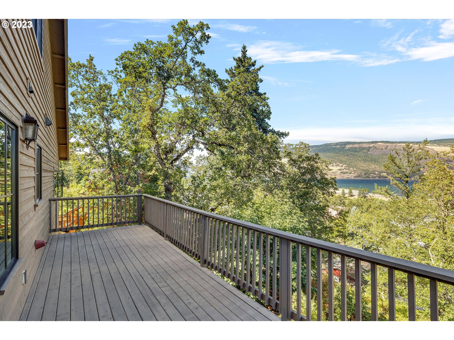 915 Fifth Avenue Mosier, OR 97040 - Photo 23 of 34 a view of balcony with wooden floor