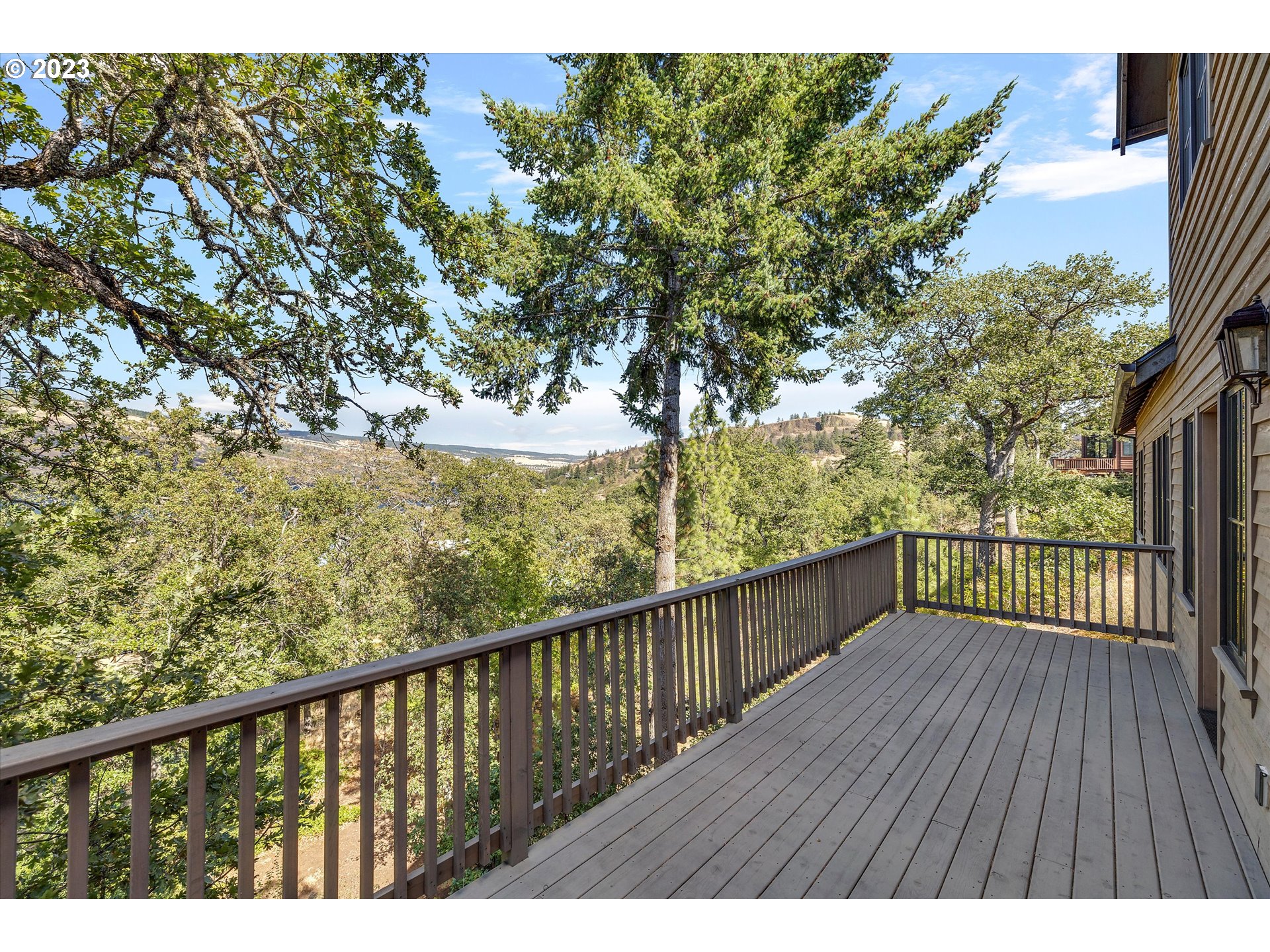 915 Fifth Avenue Mosier, OR 97040 - Photo 25 of 34 a view of balcony with wooden floor