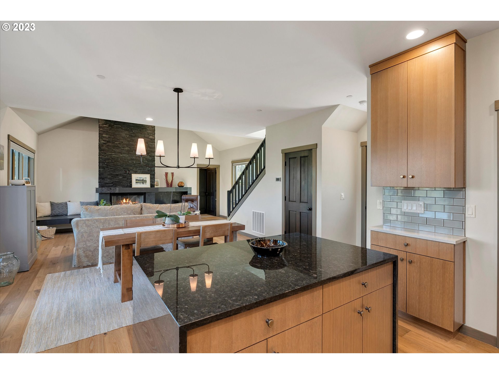 915 Fifth Avenue Mosier, OR 97040 - Photo 9 of 34 a kitchen with stainless steel appliances granite countertop a sink counter space and cabinets