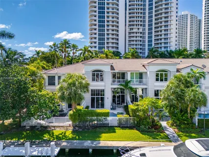 a front view of a building with garden