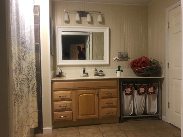 818 Forsling Road Reynolds, GA 31076 - Photo 15 of 35 a bathroom with a sink and a mirror
