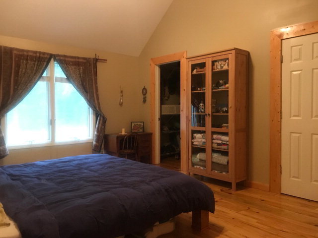 818 Forsling Road Reynolds, GA 31076 - Photo 19 of 35 a bedroom with a bed and a closet