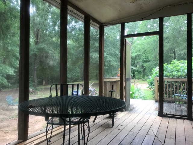 818 Forsling Road Reynolds, GA 31076 - Photo 20 of 35 a view of a two chairs in the deck