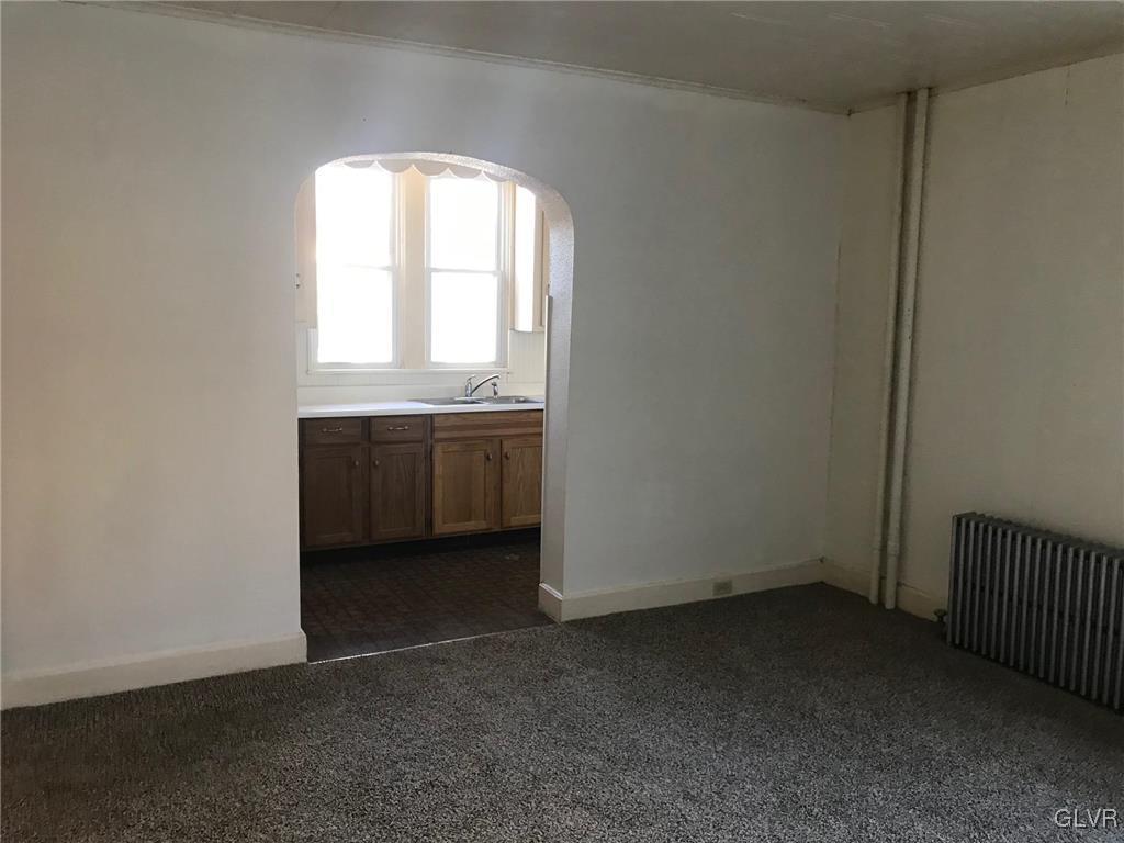 306 1st Street, Unit 1 Slatington, PA 18080 - Photo 11 of 11 an empty room with windows