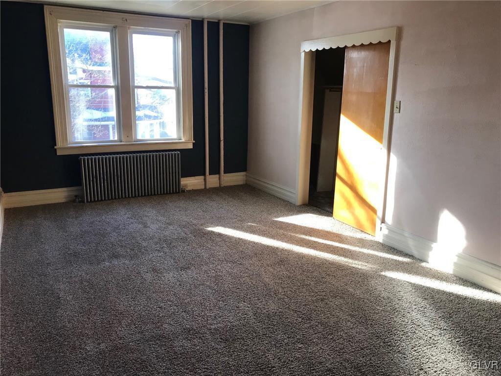 306 1st Street, Unit 1 Slatington, PA 18080 - Photo 9 of 11 an empty room with a window