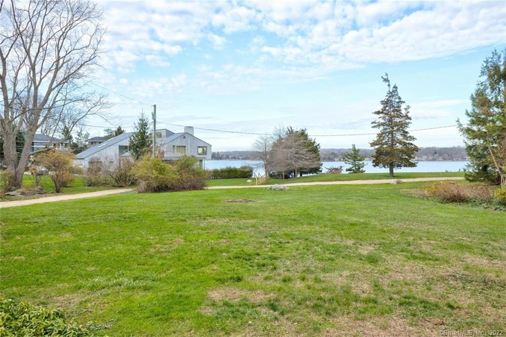 121 Uncas Point Road Guilford, CT 06437 - Photo 1 of 1 Imagine how happy and relaxed you'll feel every time you see this magnificent view of Joshua Cove from your front yard and from the expansive windows in the home's living room, dining room, and master bedroom.