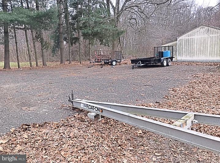 108 Rutgers Road Pennsville, NJ 08070 - Photo 27 of 35 Graveled lot used for trailers etc.