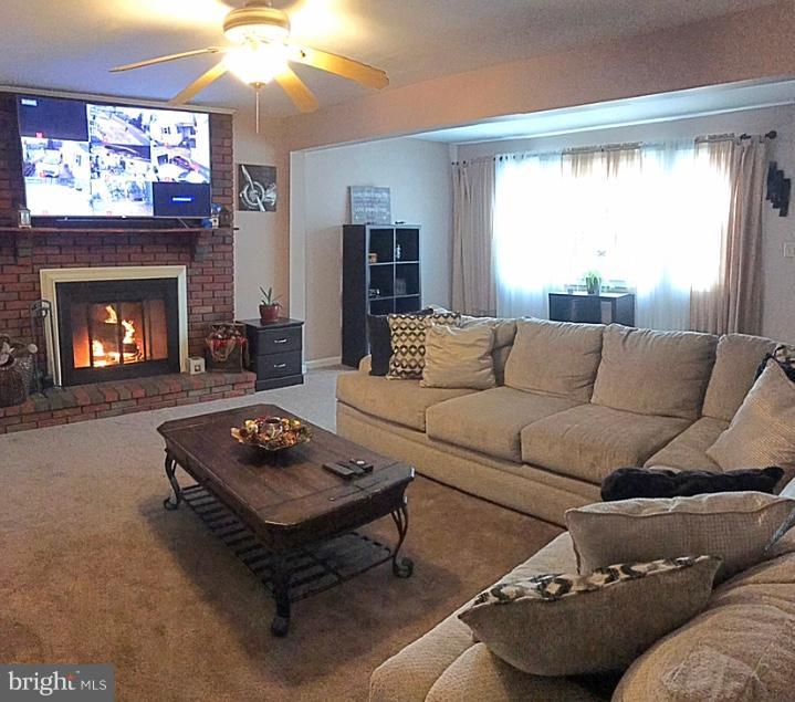 108 Rutgers Road Pennsville, NJ 08070 - Photo 4 of 35 Living Room with views of the security system!