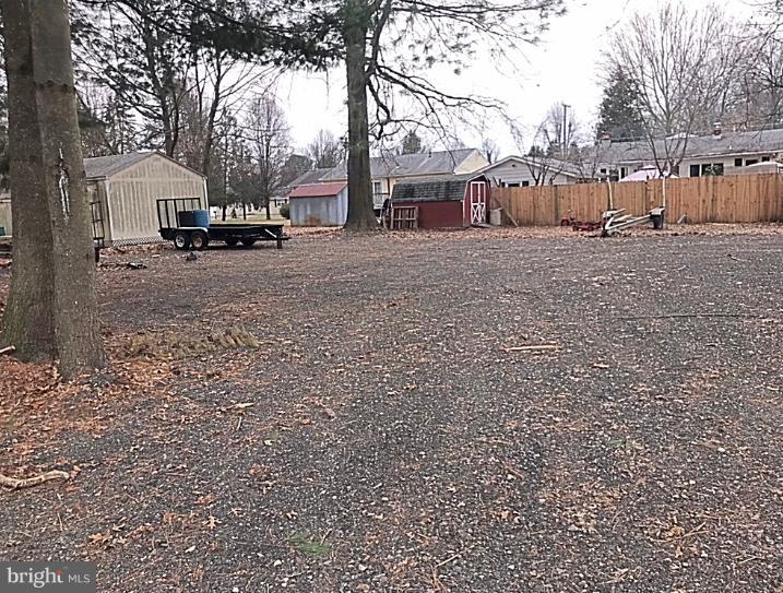 108 Rutgers Road Pennsville, NJ 08070 - Photo 31 of 35 Graveled lot used for trailers etc.
