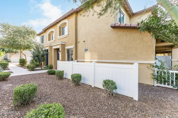 a view of a house with a street