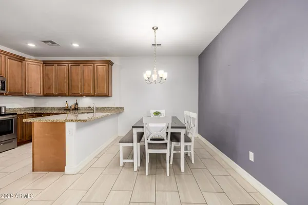 a kitchen with a sink cabinets and window