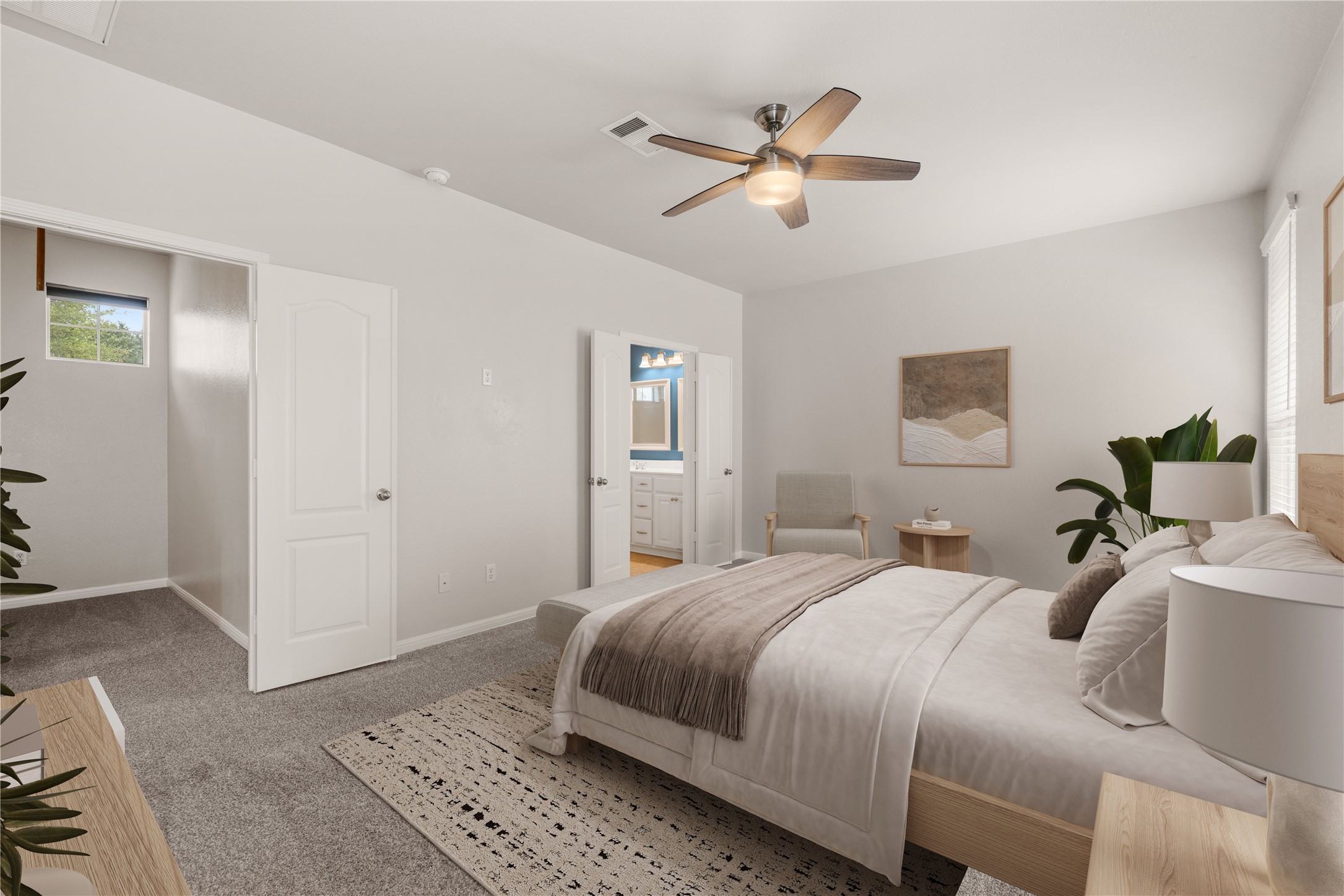 11000 Anderson Mill Road, Unit 45 Austin, TX 78750 - Photo 6 of 32 a bedroom with a large bed and a chandelier