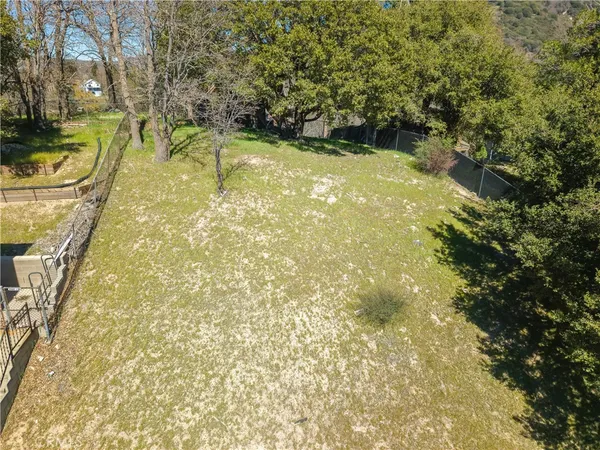 a view of swimming pool from a yard