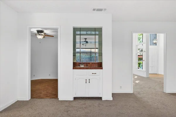 a backyard of a house with seating space