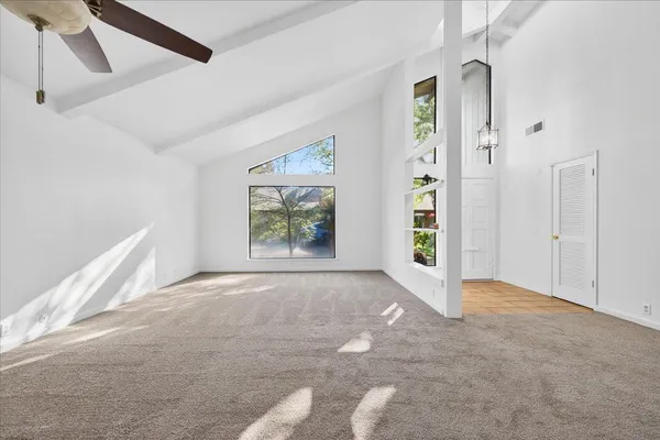 a view of a hallway with closet